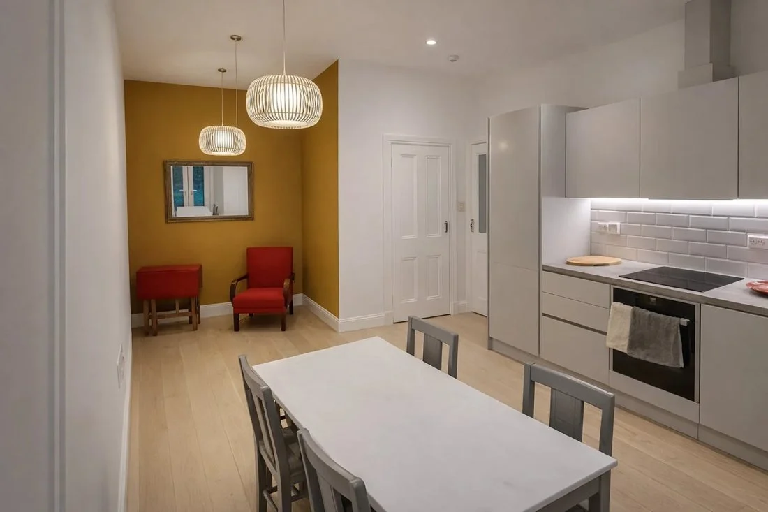 Kitchen with a dining area beside the cabinets.