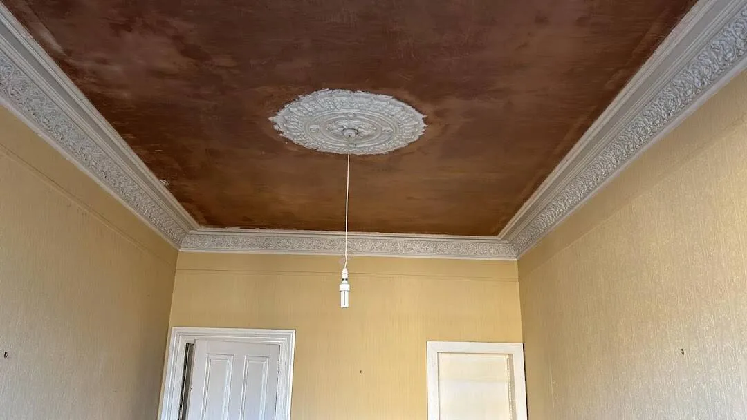 Plastering work in an Edinburgh tenement flat during renovation
