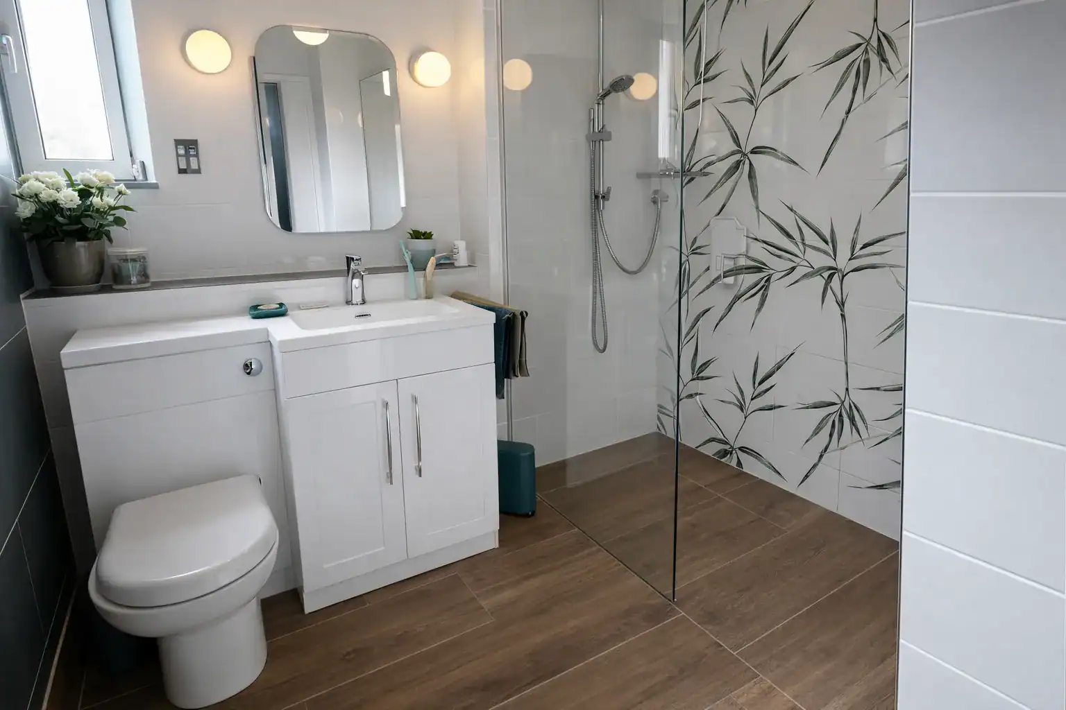 Finished bathroom with a walk-in shower and patterned wall tile