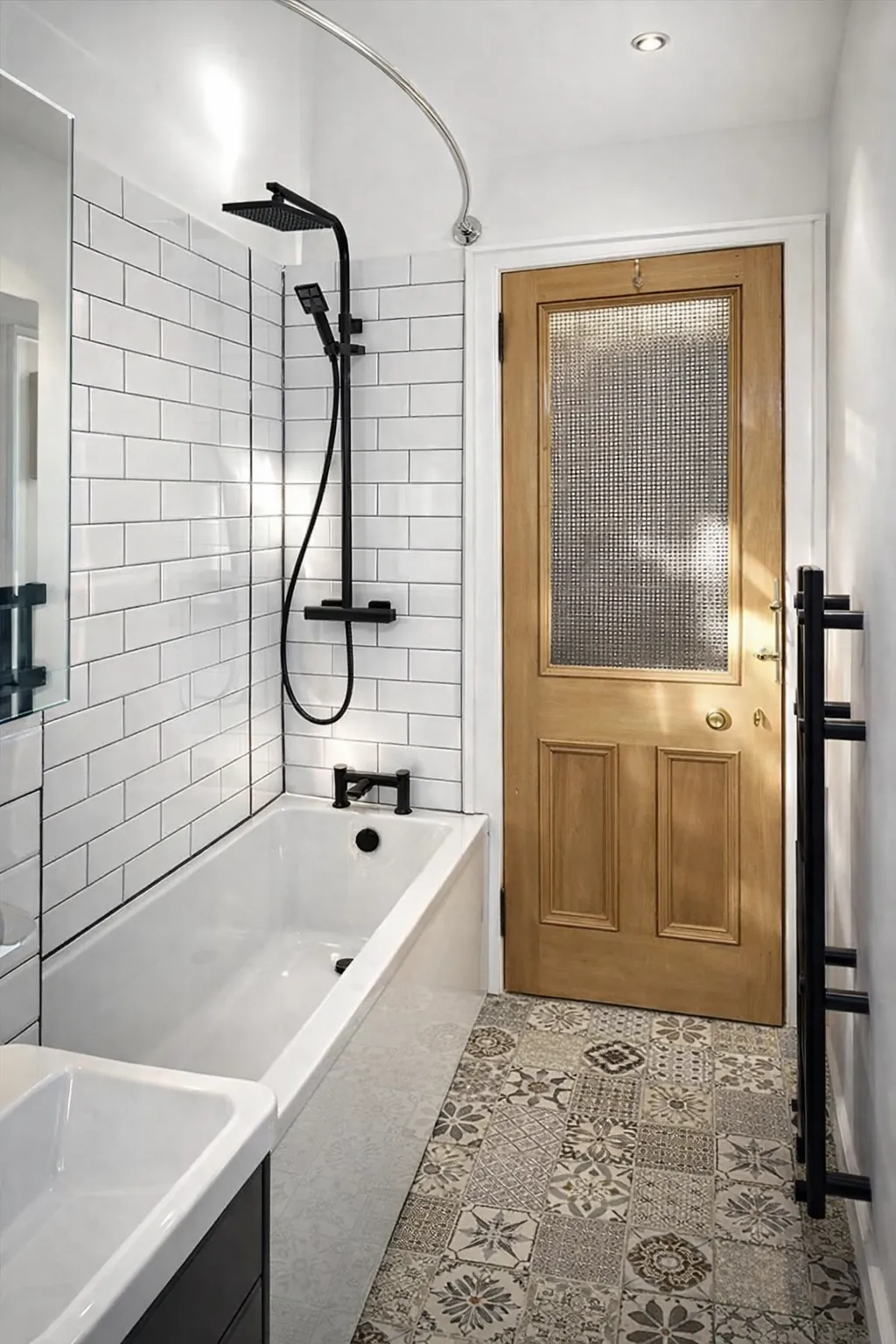 Completed bathroom fitting with tiled shower enclosure in Edinburgh